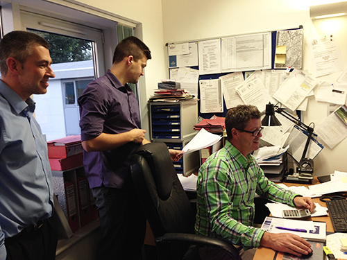 Jackson team coordinating work in the office